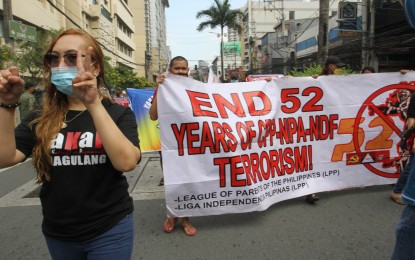 <p><strong>NO TO YOUTH RECRUITMENT. </strong>Members of the League of Parents of the Philippines and Yakap ng Magulang reiterate their call for the Communist Party of the Philippines-New People's Army to stop the recruitment of minors and students during a rally at the University Belt in Manila in 2021. They also called for an end to insurgency that has been plaguing the country for over 50 years. <em>(PNA photo by Avito Dalan) </em></p>