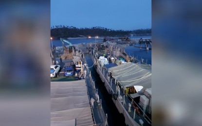 <p><strong>RELIEF OPS.</strong> The Philippine Navy's landing crafts BRP Iwak and BRP Ivatan arrive at Dapa, Siargao Island on Wednesday (Dec. 22, 2021). The ships carried relief supplies for typhoon-affected communities on the island. <em>(Photo courtesy of Philippine Navy)</em></p>