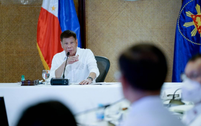 <p><strong>CASH ASSISTANCE.</strong> President Rodrigo Roa Duterte talks to the people after holding a meeting with some government officials at the Malacañan Palace on Monday (Dec. 27, 2021). Duterte promised to give PHP5,000 to indigent families affected by Typhoon Odette.<em> (Presidential photo by King Rodriguez)</em></p>