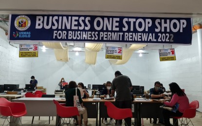 <p><strong>BOSS.</strong> Clients applying for renewal of business permits troop to the Business One Stop Shop at the Festive Walk Mall in Iloilo City on Monday (Jan. 3 2021). Four offsite BOSS branches in malls will accept renewal applications without penalties until January 20. <em>(Photo courtesy of LEDIP)</em></p>