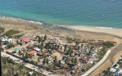 <p><strong>GAINS AMID LOSSES</strong>. The provincial government of Negros Oriental has reported significant accomplishments in 2021 even as Typhoon Odette devastated large areas of the province in mid-December. The aerial photo, taken on Dec. 26, 2021, shows a coastal area ravaged by the typhoon. <em>(Photo from the Facebook page of the provincial government of Negros Oriental)</em></p>