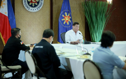 <p><strong>NEW VARIANT</strong>. President Rodrigo Roa Duterte presides over a meeting with the Inter-Agency Task Force on the Emerging Infectious Diseases (IATF-EID) core members at the Malacañan Palace on Thursday (Jan. 6, 2022). Duterte expressed concerns over the new B.1.640.2 lineage or the IHU Covid-19 variant, saying it will enter the country "whether we like it or not."<em> (Presidential photo by Robinson Niñal)</em></p>