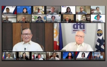 <p><strong>NEW PCCI OFFICERS.</strong> Newly sworn-in officials of the Philippine Chamber of Commerce and Industry pay a virtual courtesy call on Trade Secretary Ramon Lopez (right) on Thursday (Jan. 6, 2022). PCCI president George Barcelon (left) was assured by Lopez (right) there will no longer be hard lockdowns. (Photo courtesy of PCCI)</p>