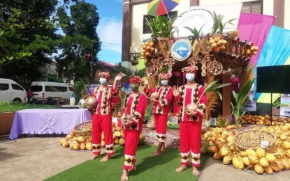 <p><strong>SUSTAINING LEGACY.</strong> Tourism workers wearing “Higaonon” indigenous clothes present one of the booths in the Misamis Oriental capitol grounds on Sunday (Jan. 9, 2022), representing the municipality of Talisayan. Jeffrey C. Saclot, the provincial tourism chief, delivers the opening salvo on Monday (January 10) for the 9th Kuyamis Festival in line with the 92nd celebration of the province’s founding anniversary. <em>(Screengrab via MisOr PIO)</em></p>