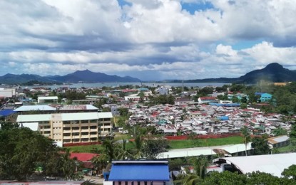 <p><strong>LIMITED MOVEMENT</strong>. The view of Tacloban City's downtown from the city hall building on this Dec. 23, 2021 photo. Alarmed by rising new Covid-19 cases, the city government on Thursday (Jan. 13, 2022) issued a directive limiting the movement of unvaccinated individuals. <em>(PNA photo by Sarwell Meniano)</em></p>