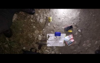 <p><strong>EVIDENCE</strong>. The confiscated pieces of evidence from a drug suspect who was killed by operatives in a buy-bust operation in Barangay Muzon, City of San Jose del Monte, Bulacan on Wednesday night (Jan. 19, 2022). Nine other drug suspects were nabbed in separate operations.<em> (Photo courtesy of Bulacan Police Provincial Office)</em></p>
