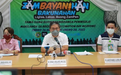 <p><strong>REGIONAL VAX DAYS</strong>. Dr. Joshua Brillantes, Department of Health-Zamboanga Peninsula (DOH-9) regional director, (center) announces during a press conference in Zamboanga City on Friday (Jan. 21, 2022) the conduct of a three-day regional vaccination drive in the region from January 26 to 28. He said they target to vaccinate 300,000 individuals during the three-day campaign. <em>(Photo courtesy of DOH-9)</em></p>