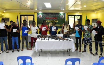 <p><strong>NEW LIFE</strong>. Ten of the 23 surrendering batch of combatants from the extremist Bangsamoro Islamic Freedom Fighters and Dawlah Islamiya groups operating in Central Mindanao pledge their allegiance to the government during a ceremony held at the Army’s 1st Mechanized Infantry Battalion in Ampatuan, Maguindanao on Friday (Jan. 21, 2022). The Army’s 6th Infantry Division said a total of 53 former violent extremists have yielded to their various field units this month alone. <em>(Photo courtesy of 6ID)</em></p>