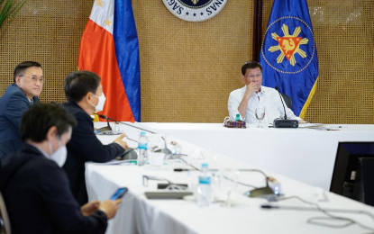 <p><strong>NOT POLITICKING</strong>. President Rodrigo Roa Duterte presides over a meeting with the Inter-Agency Task Force on the Emerging Infectious Diseases (IATF-EID) core members prior to his Talk to the People at the Malacañan on Jan. 24, 2022. Duterte said naming “most corrupt” candidates is not politicking but part of his job as head of the country. <em>(Presidential photo by Toto Lozano)</em></p>