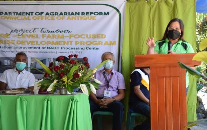 <p><strong>TURNOVER.</strong> Department of Agrarian Reform Regional Director Shiela Enciso speaks to beneficiaries during the turnover of a PHP300, 000 worth processing center in Barangay Nagbangi I, San Remigio, Antique on Jan. 21, 2022. Annalyn Fernando, chair of the Nagbangi 1 Multi - Purpose Cooperative which is the recipient of the processing center, said on Tuesday (January 25) they now have a permanent center where they could process their food products. <em>(Photo courtesy of DAR Antique)</em></p>
