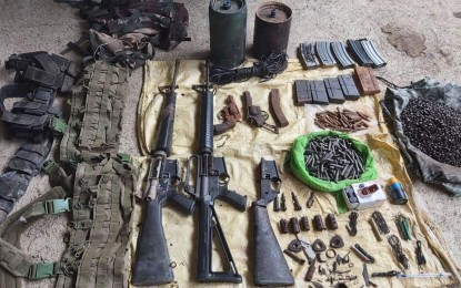 <p><strong>RECOVERED</strong>. Government troops recovered on Saturday (Jan. 22, 2022) war materiel comprised of two M16 rifles, two .38-caliber pistols, two anti-personnel mines, and a plastic containing at least 15 kilograms of shrapnel in Barangay Maalo, Juban, Sorsogon. Maj. John Paul Belleza, 9th Infantry Division (9ID) spokesperson, in a statement on January 25 said soldiers and police personnel were conducting security operations in the said area which led to the discovery of the weapons. <em>(Photo courtesy of 9ID)</em></p>