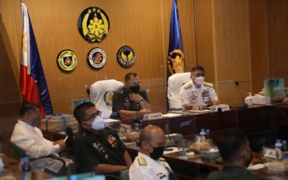 <p><strong>FINAL PUSH.</strong> AFP Chief, Gen. Andres Centino (center), holds a command conference with chiefs of the military's major services and unified commands in Camp Aguinaldo, Quezon City on Tuesday (Jan. 25, 2022). He urged officials to sustain the AFP's momentum in the fight against communist terrorism to end local armed conflict before the end of President Rodrigo Duterte's term in June.<em> (Photo courtesy of AFP)</em></p>