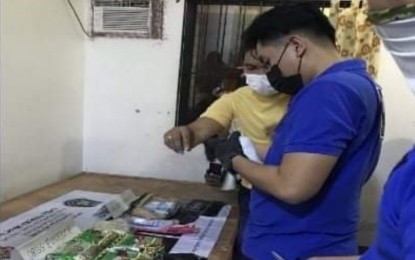<p><strong>MAKATI BUY-BUST.</strong> Members of the PNP Drug Enforcement Group account for pieces of evidence from a buy-bust operation in Barangay Palanan, Makati City on Wednesday night (Jan. 26, 2022). Two suspects were arrested and 6 kg. of suspected shabu, valued at PHP40.8 million, were seized during the operation.<em> (Photo courtesy of PNP-DEG)</em></p>