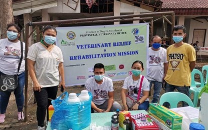<p><strong>VET REHAB MISSION</strong>. Personnel of the Provincial Veterinary Office in Negros Occidental provide services to livestock and poultry animals in Kabankalan City on Wednesday (Jan. 26, 2022). The activity is part of the month-long veterinary relief and rehabilitation mission in areas hit by Typhoon Odette, which brought a PHP742-million loss to the local livestock and poultry industry. <em>(Photo courtesy of PIO Negros Occidental)</em></p>