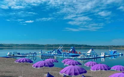 <p><strong>TO WELCOME VISITORS</strong>. These Bali-inspired umbrellas are waiting at the Paoay Lake's visitors’ lounge. Its inflatable island, along with other waterpark amenities, is set to open on Jan. 30, 2022, Ilocos Norte provincial government said on Friday (January 28). <em>(Photo courtesy of the Ilocos Norte Tourism)</em></p>