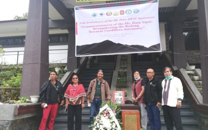 <p><strong>REST IN PEACE</strong>. Expressions of sympathy and sadness pour in after the death on Jan. 29, 2022 of Sadanga, Mountain Province Mayor Gabino Ganggangan (3rd from left), who is shown in this undated file photo. The late mayor was a strong oppositor of the CPP-NPA communist terrorist group and a staunch advocate of peace and autonomy in the Cordillera region.<em> (PNA file photo by Liza T. Agoot)</em></p>