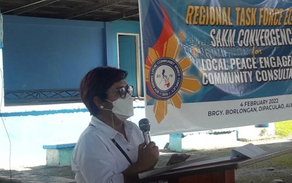 <p><strong>LOCAL PEACE ENGAGEMENT</strong>. Maria Luisa F. de Guzman, regional director of the National Intelligence Coordinating Agency (NICA), delivers her message during the peace engagement community consultation conducted by the Regional Task Force to End Local Communist Armed Conflict (RTF-ELCAC) in Barangay Borlongan, Dipaculao, Aurora on Friday (Feb. 4, 2022). During the event, a total of 40 former members of the Communist Party of the Philippines-New People's Army (CPP-NPA) in Aurora province withdrew their support from the terrorist group and pledged allegiance to the national government anew. <em>(Photo by Jason de Asis)</em></p>