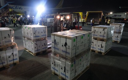 <p><strong>DELIVERED.</strong> After a one-day delay due to logistical issues, the 780,000 doses of reformulated Pfizer jabs for the vaccination of children aged 5 to 11 arrive at the Ninoy Aquino International Airport Terminal 3 on Friday night (Feb. 4, 2022). Six sites in Metro Manila will be used for the initial rollout on February 6. <em>(Photo courtesy of NTF)</em></p>