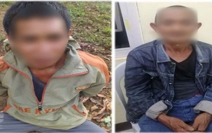 <p><strong>CAPTURED TERRORISTS.</strong> Government troops foil a bomb attack as they capture two members of the Dawlah Islamiyah-Maute Group (DI-MG) Sunday (Feb. 5, 2022) in a pursuit operation in Barangay Talao, Piagapo, Lanao del Sur. The two were captured four days after two DI-MG members were killed in a clash in Balabagan, Lanao del Sur. <em>(Photo courtesy of 1ID)</em></p>