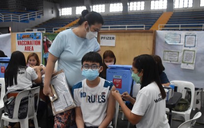 <div dir="auto"><strong>GETTING PROTECTED.</strong> A teenaged boy receives his Covid-19 vaccine in Albay in this undated photo. As of January 2022, the province has covered 58 percent of its total population of 1,423,708. <em>(Photo courtesy of Albay-PIO)</em></div>