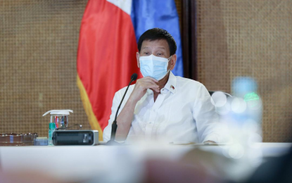<p><strong>NOT NOW</strong>. President Rodrigo Roa Duterte talks to the people after holding a meeting with key government officials at the Malacañan Palace on Monday (Feb. 7, 2022). Duterte said he is not into endorsing any presidential aspirant right now. <em>(Presidential photo by Simeon Celi).</em></p>