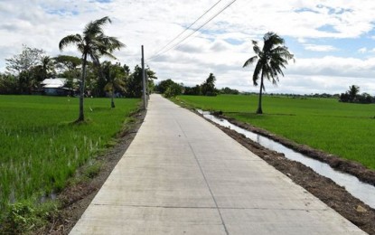 <p><strong>NEW FARM-TO-MARKET ROAD.</strong> The Department of Public Works and Highways has completed the construction of a PHP12.2-million farm-to-market road project in Cabanatuan City, Nueva Ecija which is seen to provide a better road network and increase farmers' productivity. The 3.13-kilometer project was made possible through the convergence program of the DPWH and Department of Agriculture with funding sourced from the General Appropriations Act of 2021.<em> (Photo courtesy of DPWH-3)</em></p>