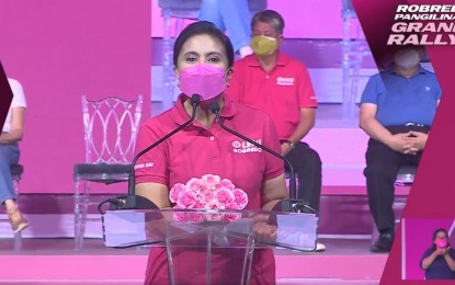 <p><strong>'PINK' CAMPAIGN.</strong> Vice President Leni Robredo speaks during the proclamation rally of the Team Robredo-Pangilinan (TROPA) in Plaza Quezon, Naga City, Camarines Sur on Tuesday (Feb. 8, 2022). The tandem vowed to uphold a culture of transparency and participatory governance if they win the May 9 polls.<em> (Screengrab from VP Leni Robredo Facebook live video)</em></p>