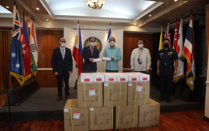 <p style="font-weight: 400;"><strong>TEST KITS.</strong> National Defense Secretary Delfin Lorenzana (3rd from left) receives the 16,000 antigen test kits donated by Israel at the DND headquarters in Quezon City on Feb. 9, 2022. Also in photo (L-R) Israel’s Defense Attaché Mr. Raz Shabtay, Ambassador Ilan Fluss, Director Franklin V. Gali, and Brig. Gen. Edgar Cardiñoza. <em>(Photo courtesy of Israel Embassy in Manila)</em></p>