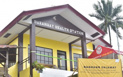 <p><strong>BDP PROJECT.</strong> Residents of Barangay Magangit in Maco town, Davao de Oro receives their newly-constructed health center from the government's Barangay Development Program (BDP) under the National Task Force to End Local Communist Armed Conflict (NTF-ELCAC) on Feb. 8, 2022. The program aims to eradicate the root causes of the insurgency, poverty, disease, lack of education and opportunities, and social injustice in far-flung communities across the country identified to have been influenced by the communist ideology. <em>(Photo courtesy of Davao de Oro PIO)</em></p>