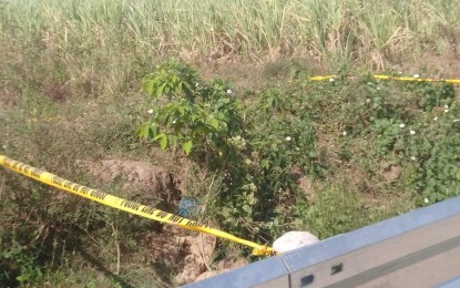 <p><strong>CONDEMNED</strong>. The site of the roadside encounter where suspected CPP-NPA members engaged policemen and detonated an anti-personal mine in Barangay Bi-ao, Binalbagan, Negros Occidental on Sunday (Feb. 13, 2022). The Western Visayas Regional Task Force to End Local Communist Armed Conflict condemned the “senseless violence” calling it a “treacherous attack” for detonating anti-personnel mine aimed at the policemen. <em>(Photo courtesy of Negros Occidental Police Provincial Office)</em></p>