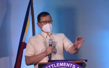 <p><strong>DHSUD TURNS 3.</strong> Secretary Eduardo del Rosario leads the kickoff event of the Department of Human Settlements and Urban Development's third founding anniversary at its central office auditorium in Quezon City on Monday (Feb. 14, 2022). The three-day celebration will carry the theme "Providing Decent Homes for Filipino Families." <em>(Photo courtesy of DHSUD)</em></p>