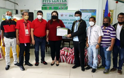 <p><strong>BIOCON LAB.</strong> Department of Agriculture Region 13 Director Ricardo Oñate Jr. (4th from right), together with Cantilan Municipal Mayor Carla Lopez-Pichay (4th from left) and Surigao del Sur 1st District Representative Prospero Pichay (3rd from left) lead the opening of the Biological Control (Biocon) Agent Laboratory in Cantilan, Surigao del Sur on Monday (Feb. 14, 2022). The laboratory will help the rice farmers eliminate and control pest infestation and rice farm diseases in five towns in the province. <em>(Photo courtesy of DA-13)</em></p>