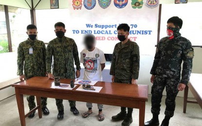 <p><strong>NEW LIFE AHEAD</strong>. A former member of the dismantled communist guerilla front Kilusang Larangang Gerilya-Sierra Madre (KLG-SM) of the New People’s Army (NPA) surrendered to government troops in Nueva Ecija on Tuesday (Feb. 16, 2022). Alias 'Ka Pado' also yielded his firearm and hand grenade to the 1st Provincial Mobile Force Company of the Nueva Ecija Police Provincial Office.<em> (Photo courtesy of the Army's 91IB)</em></p>