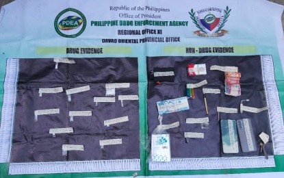 <p><strong>BUSTED DRUG PEDDLERS.</strong> Authorities confiscate PHP165,000 worth of suspected shabu in a buy-bust operation on Nazareno Street in Barangay Central, Mati City, Davao Oriental on Wednesday (Feb. 16, 2022). The suspects, identified as Gian Alexis Flores, the number two provincial target; drug den maintainer Kristoffer Aliezon; and drug den visitor Norwin Liguez were all arrested and charged with violation of Republic Act 9165 or the Comprehensive Dangerous Drugs Act of 2002. <em>(Photo courtesy of PDEA-11)</em></p>
<p><em> </em></p>