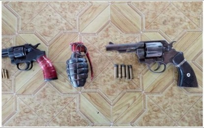 <p><strong>VOLUNTARY SURRENDER</strong>. Three suspected members of the CPP-NPA and two farmers surrendered and turned over firearms and explosives to the police in Sta. Catalina, Negros Oriental on Monday (Feb. 21, 2022). The number of rebel surrenderers has been snowballing in the past months in different parts of the country.<em> (Photo courtesy of the NOPPO)</em></p>