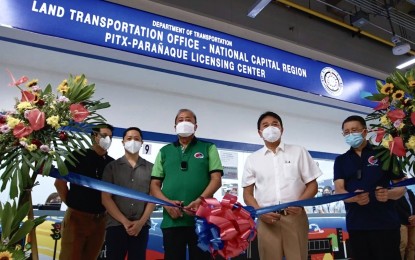 <p><strong>OPEN ON SATURDAYS.</strong> Transportation Secretary Arthur Tugade (3rd from right) and other government officials during the ribbon-cutting of the LTO office at PITX in February 2022. The LTO at the PITX will be open to the public on Saturdays starting June 11. <em>(PNA photo)</em></p>