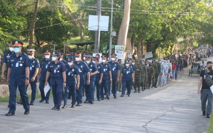 <p><strong>UNITY WALK.</strong> Some 200 individuals including local candidates in the province of Aurora participated in a unity walk in Baler on Thursday (Feb. 24, 2022) to signify their desire to make the voting exercise safe, peaceful and orderly. A peace covenant and a manifesto condemning the communist terrorist groups were also signed during the event. <em>(Photo by Jason de Asis)</em></p>
