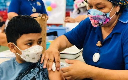 <p><strong>RESBAKUNA KIDS.</strong> A young boy receives the vaccine against Covid-19 in Dumaguete City on Feb. 21, 2022. The province has inoculated 2,212 children aged 5-11 and has reached 53.1 percent of its total target population as of February 24. <em>(Photo from Negros Oriental's Facebook page)</em></p>
