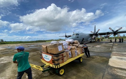 <p><strong>VEGGIES FOR SIARGAO.</strong> Seven tons of various kinds of vegetables from the Cordillera Region are unloaded from a C-130 military plane at the Sayak Airport in Del Carmen, Siargao Island, Surigao del Norte on Wednesday (Feb. 23, 2022). The vegetables were distributed to the affected residents in the towns of Dapa, Del Carmen, Pilar, Burgos, and the two community kitchens each in the towns of San Isidro on the island.<em> (Photo contributed by Ivy Marie Mangadlao)</em></p>
