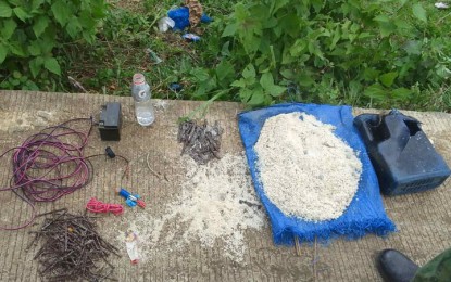<p><strong>FOILED BOMBING.</strong> Troops recover bomb components as they safely defuse an improvised explosive device (IED), preventing a roadside bombing in Barangay Anuling, Patikul, Sulu on Sunday (Feb. 27, 2022). The location of the IED was established through the timely information provided to the military by concerned residents. <em>(Photo courtesy of the Joint Task Force Sulu)</em></p>