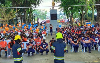 <p><strong>FIRE PREVENTION MONTH.</strong> Members the Bureau of Fire Protection – Soccsksargen (BFP-12), including those from Koronadal City, hold a short program early Tuesday (March 1, 2022)  at the city’s Rizal Park to kick off the Fire Prevention Month observance this year. The BFP-Koronadal is intensifying the conduct of fire safety awareness campaigns at the barangay level due to the increasing fires caused by negligence.<em> (Photo courtesy of Koronadal CDRRM Officer Cyrus Urbano)</em></p>