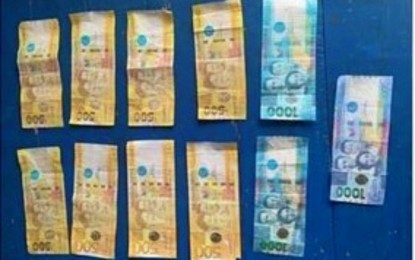 <p><strong>FAKE MONEY.</strong> The fake bills seized from a suspect upon her arrest in Upi, Maguindanao on Monday (Feb. 28, 2022). The counterfeit currency, amounting to PHP7,000, was used to dupe 10 market vendors at the Upi town market.<em> (Photo courtesy of PRO-BARMM)</em></p>