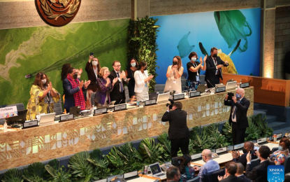<p><strong>GLOBAL TREATY.</strong> Delegates celebrate the adoption of a resolution to end plastic pollution at the closing meeting of the resumed fifth session of the UN Environment Assembly (UNEA-5) in Nairobi, Kenya, on March 2, 2022. The resumed UNEA-5 wrapped up with delegates adopting a resolution to pave the way for the establishment of a legally binding global treaty by 2024 to end plastic pollution. <em>(Xinhua/Dong Jianghui)</em></p>