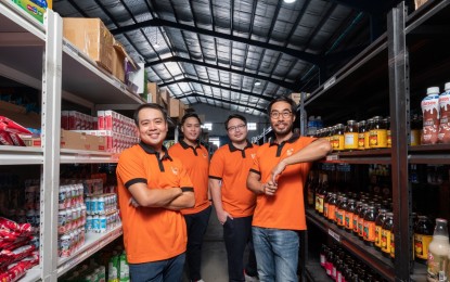 <p><strong>E-COMMERCE</strong>. Social e-commerce startup SariSuki co-founders at e-commerce grocery warehouse in Metro Manila in February 2022. From left to right are chief commercial officer Bam Mejia, chief operating officer Philippe Lorenzo, head of strategy and fundraising Angelo Lee, and chief executive officer Brian Cu. <em>(Photo courtesy of SariSuki)</em></p>
