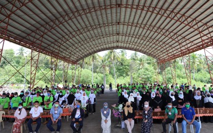 <p><strong>LIVELIHOOD TRAINING.</strong> The 331 decommissioned combatants of the Moro Islamic Liberation Front and their relatives are awarded training certificates after completing livelihood courses in Datu Odin Sinsuat, Maguindanao on Thursday (March 10, 2022). The livelihood training is part of the socio-economic development program under the Annex on Normalization of the Comprehensive Agreement on the Bangsamoro. <em>(Photo courtesy of OPAPRU)</em></p>