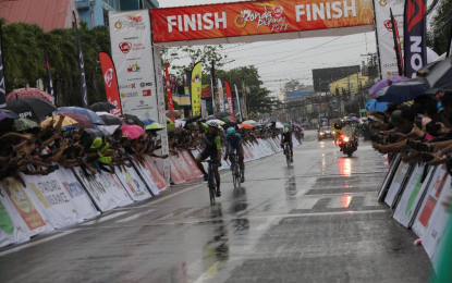 <p><strong>STAGE 4 WINNER</strong>. Defending champion George Oconer wins the 179.8-kilometer Stage Four of the 11th LBC Ronda Pilipinas at the Provincial Capital in Daet, Camarines Norte on Sunday (March 13, 2022). Oconer bested other podium finishers Mervin Corpuz and Arjay Peralta. <em>(Contributed photo)</em></p>