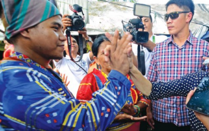 <p><strong>BIG FISH.</strong> Jong Monzon, one of the most visible resource persons representing the allegedly harassed Indigenous People groups in Mindanao, surrenders to government troops on March 8, 2022 in Davao Oriental. He has since admitted he was assigned by the Communist Party of the Philippines-New People's Army to help the rebels anti-government activities inside the UCCP-Haran Bakwit School in Davao City since 2015. In this 2016 photo, Monzon is seen speaking to the media outside of the Haran facility.<em> (File photo by Christine Cudis)</em></p>