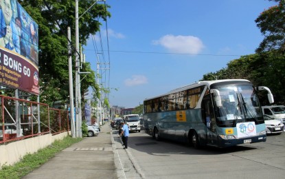 <p><strong>GOING HOME</strong>. The bus carrying “Balik Probinsya, Bagong Pag-asa” program beneficiaries bound for the province of Masbate on Tuesday (March 15, 2022). The BP2 program has facilitated a total of 654 individuals who wished to go back to their provinces, since the start of the Covid-19 pandemic.<em> (PNA photos by Robert Oswald P. Alfiler)</em></p>