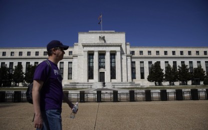 <p>A man walks past the U.S. Federal Reserve in Washington, D.C., the United States, on March 16, 2022.<em> (Photo by Ting Shen/Xinhua)</em></p>