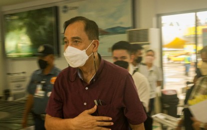 <p><strong>OIL SUBSIDY</strong>. Agriculture Secretary William Dar arrives at the Tacloban Airport on Thursday (March 17, 2022) to start the nationwide roll-out of fuel subsidies for corn farmers and fishermen. He announced a PHP1.1 billion budget for fuel subsidies of corn farmers and fishermen in the country to cushion the impact of soaring oil prices. <em>(Photo courtesy of Department of Agriculture Eastern Visayas)</em></p>